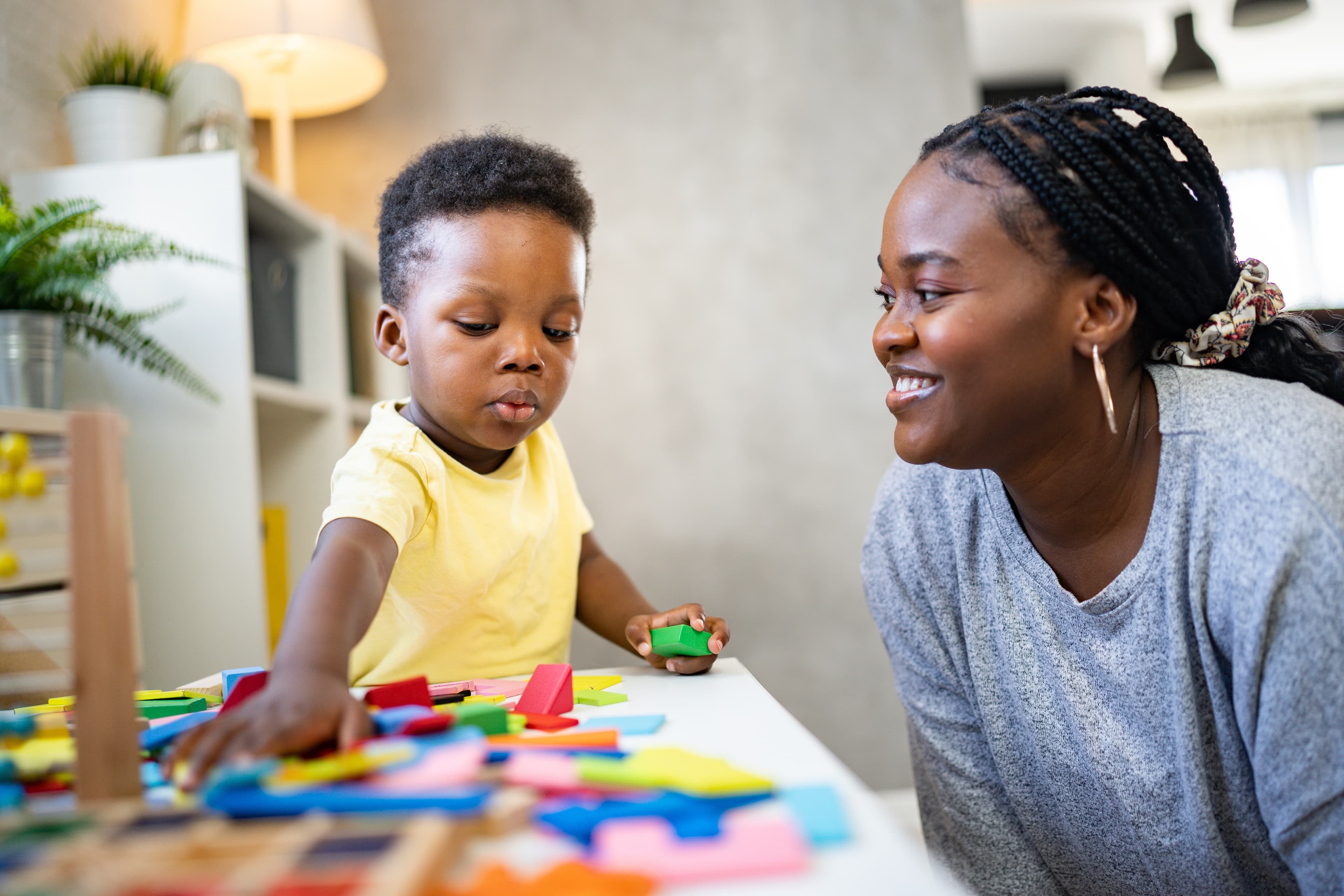 A teacher and preschool student at Green Cedar International School
